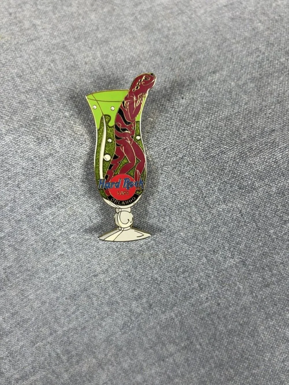 Hard Rock Cafe Orlando Dinosaur Hurricane Glass Green Glitter Pin